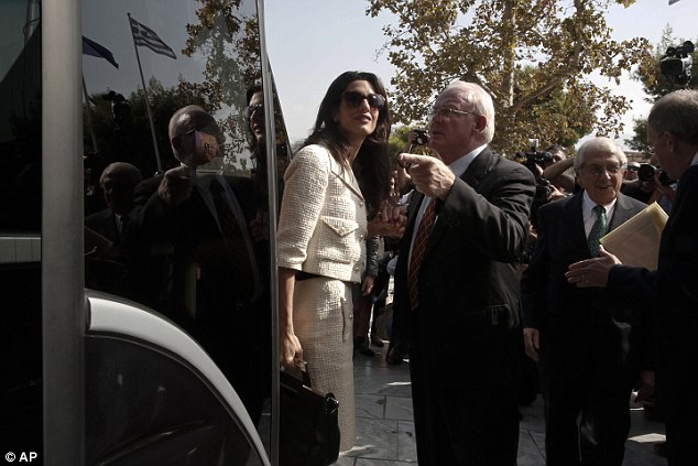 1413373436304_wps_3_Lawyer_Amal_Clooney_centr