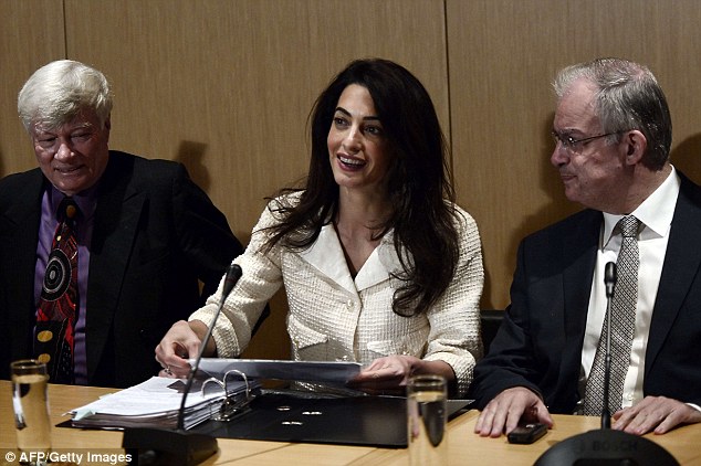 1413373440666_wps_4_Human_rights_lawyer_Amal_