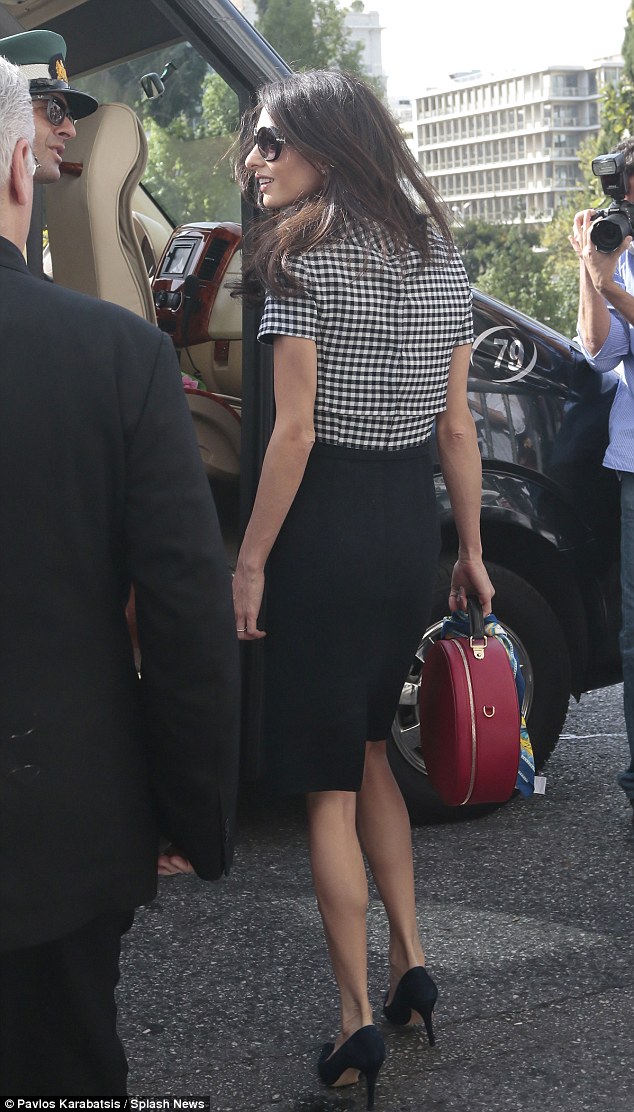 1413464130541_wps_79_Amal_Clooney_leaves_Athen