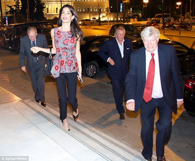 1413533004704_Image_galleryImage_Amal_Clooney_leave_the_vi