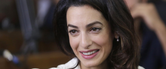 Amal Clooney, a member of the legal team representing Canadian Al-Jazeera English journalist Mohammed Fahmy sits in a courtroom in Tora prison in Cairo, Egypt, Saturday, Aug. 29, 2015. An Egyptian court on Saturday sentenced three Al-Jazeera English journalists to three years in prison, the last twist in a long-running trial criticized worldwide by press freedom advocates and human rights activists. (AP Photo/Amr Nabil)