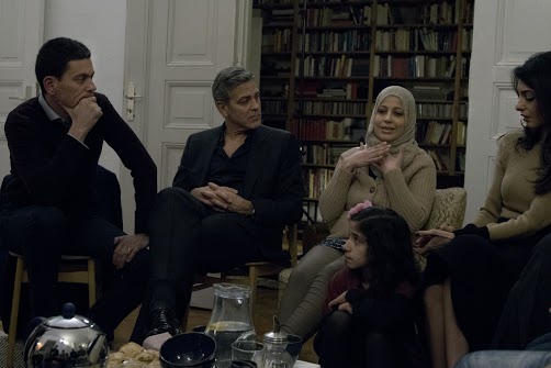 IRC President and CEO David Miliband, George Clooney, and Amal Clooney meet with Syrian Refugees Mona (woman) and her daughter, 11-year-old Joudi (young girl)