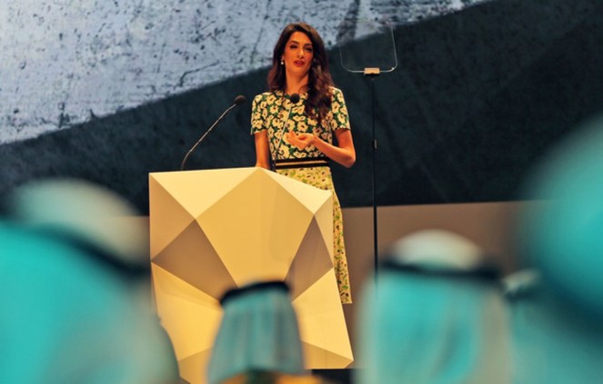 Amal Alamuddin Clooney, writer, human rights activist, talks during the opening ceremony of the International Government Communications Forum in Sharjah, United Arab Emirates, Sunday, March 20, 2016. (AP Photo/Kamran Jebreili)
